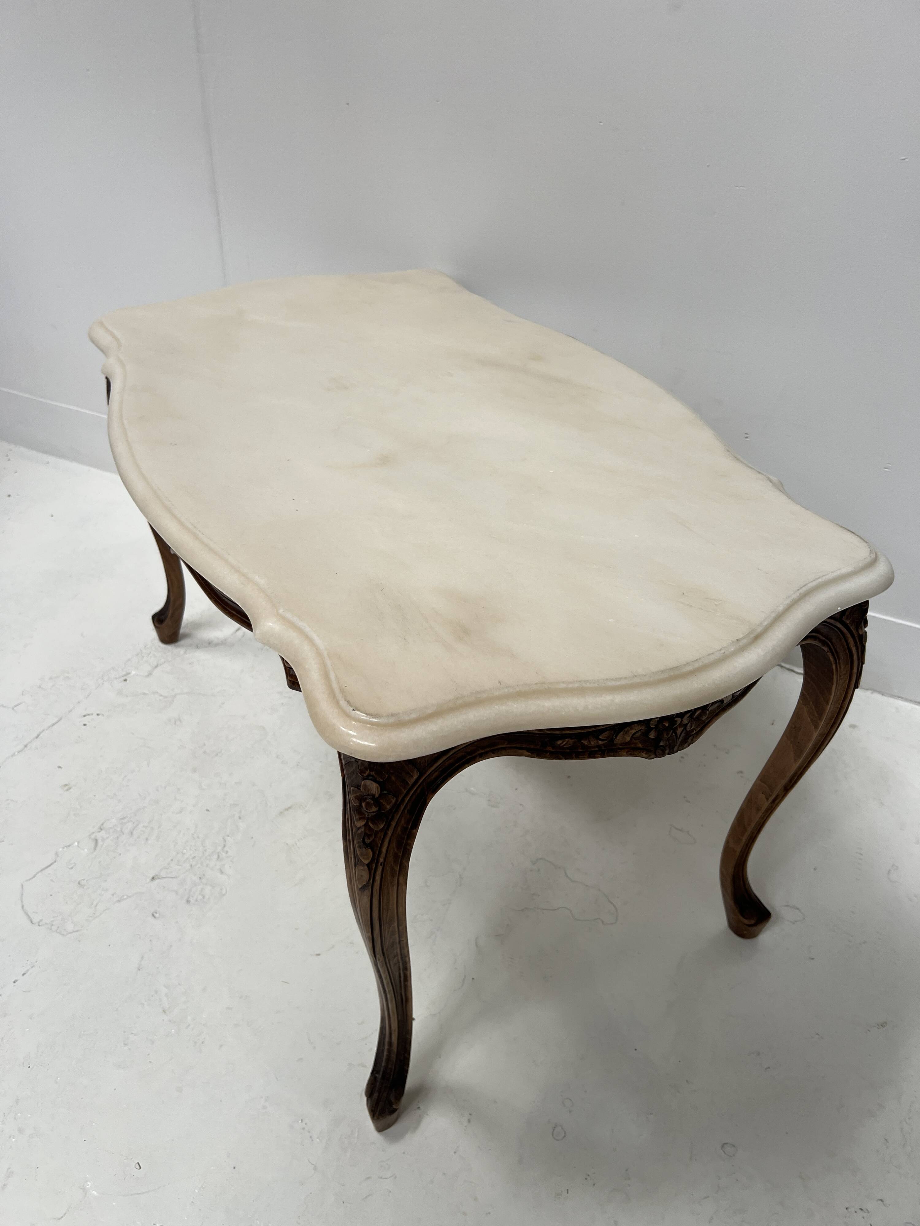 Louis XV style coffee table in patinated beech, 20th century.