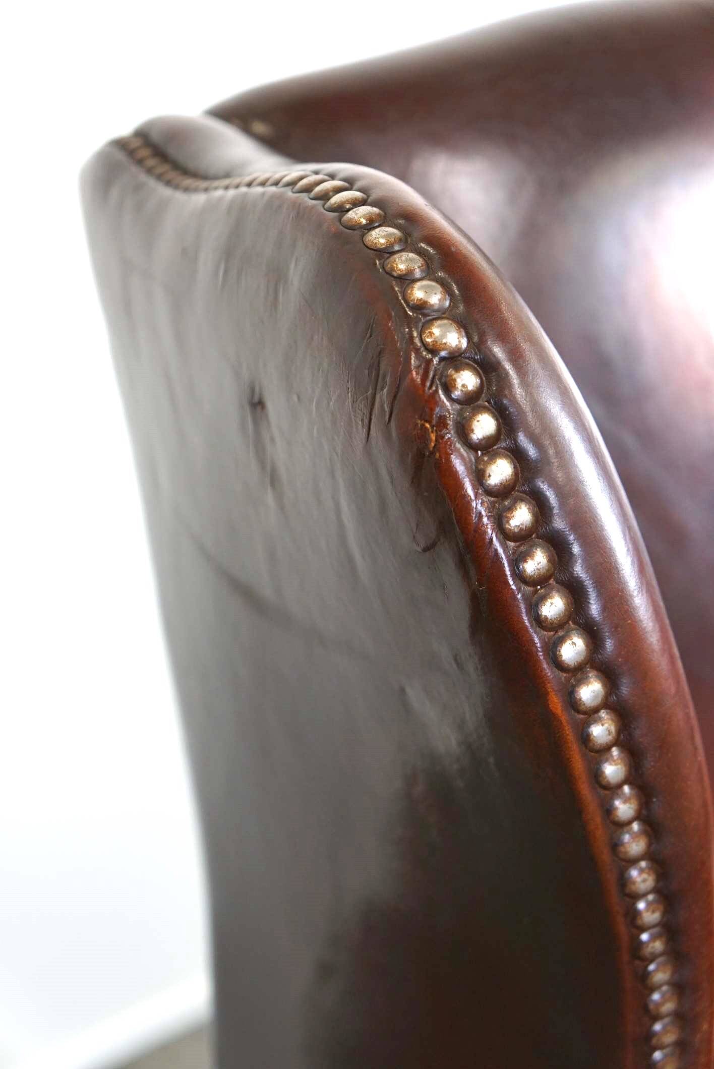 Beautiful classic and stately wingback armchair made of sheep leather with beautiful colors