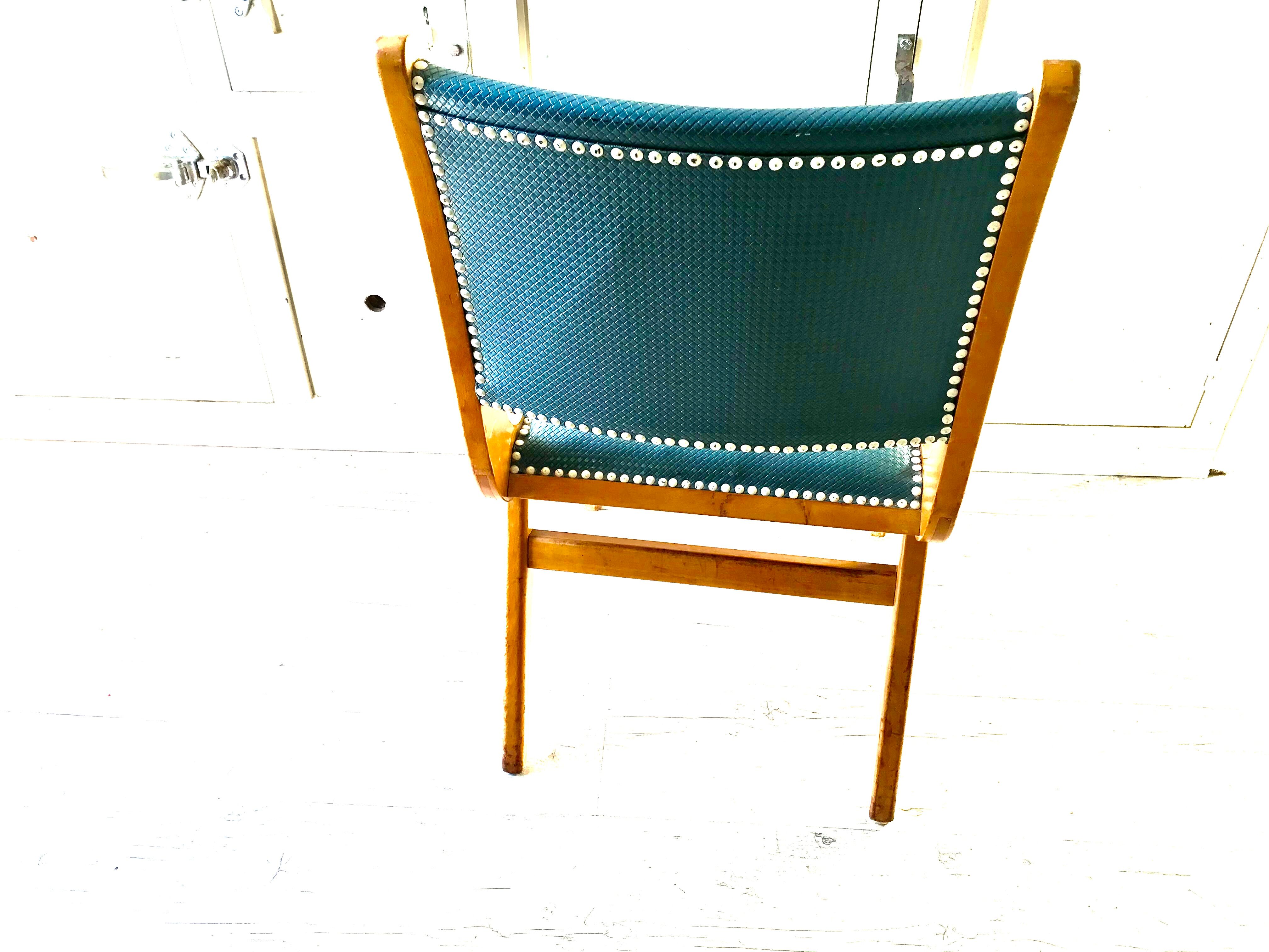Vintage compass foot chair and studded blue skai