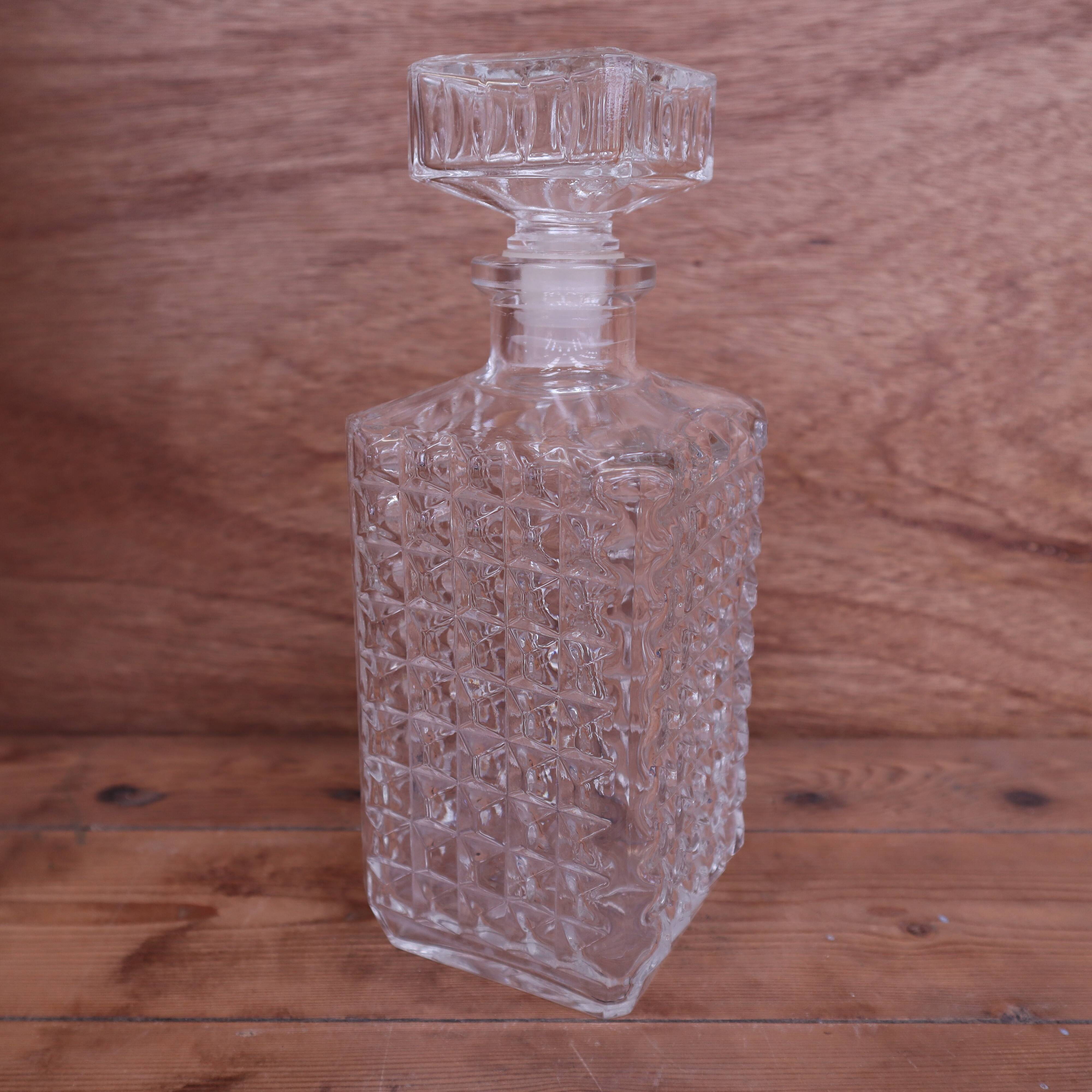 Vintage cut glass whisky decanter with diamond point design, 1960s.