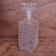 Vintage cut glass whisky decanter with diamond point design, 1960s.