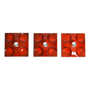 Three beautiful original 1970s Space Age red ceramic wall lamps