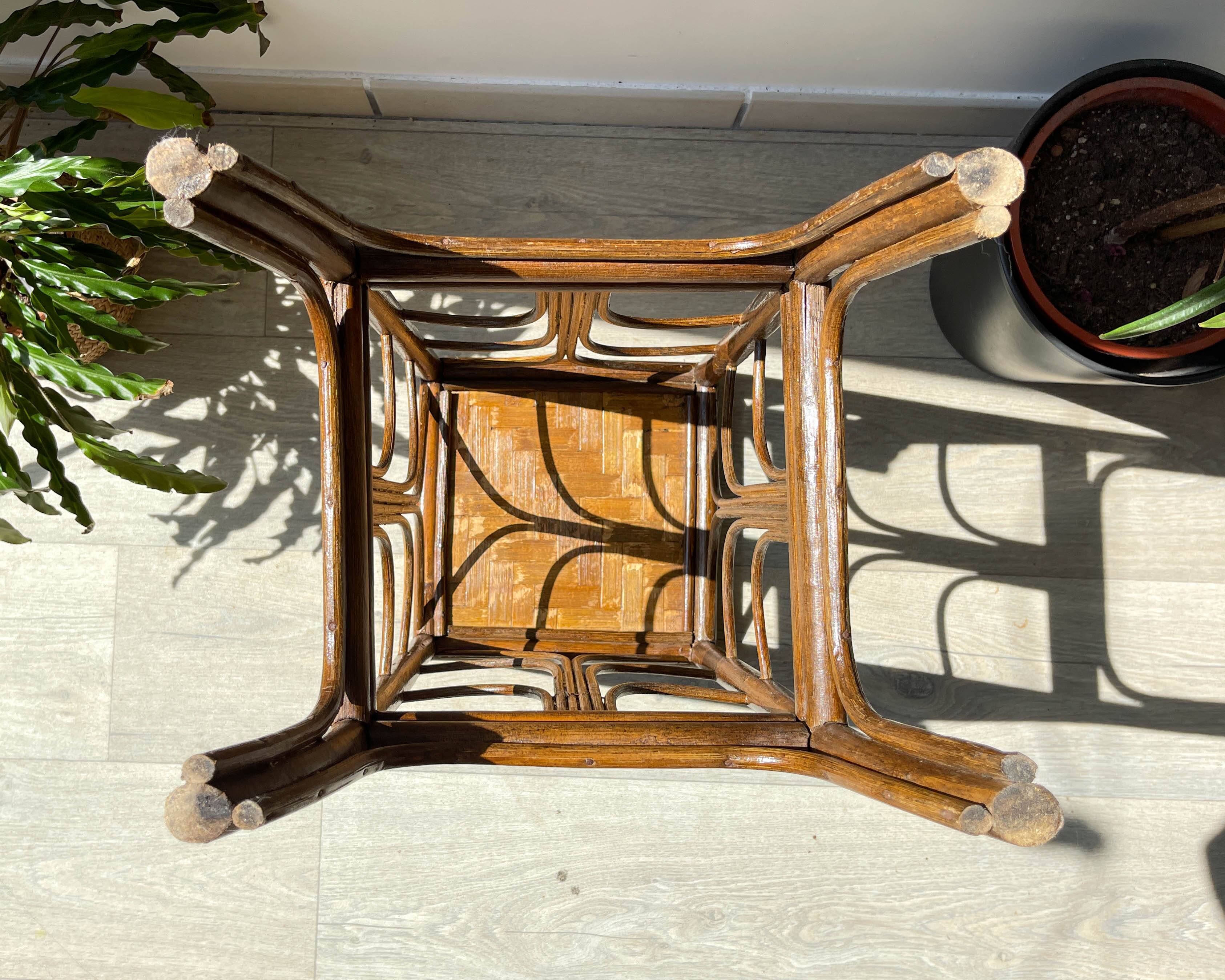 Vintage rattan plant stand in Art Deco style