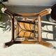 Vintage rattan plant stand in Art Deco style