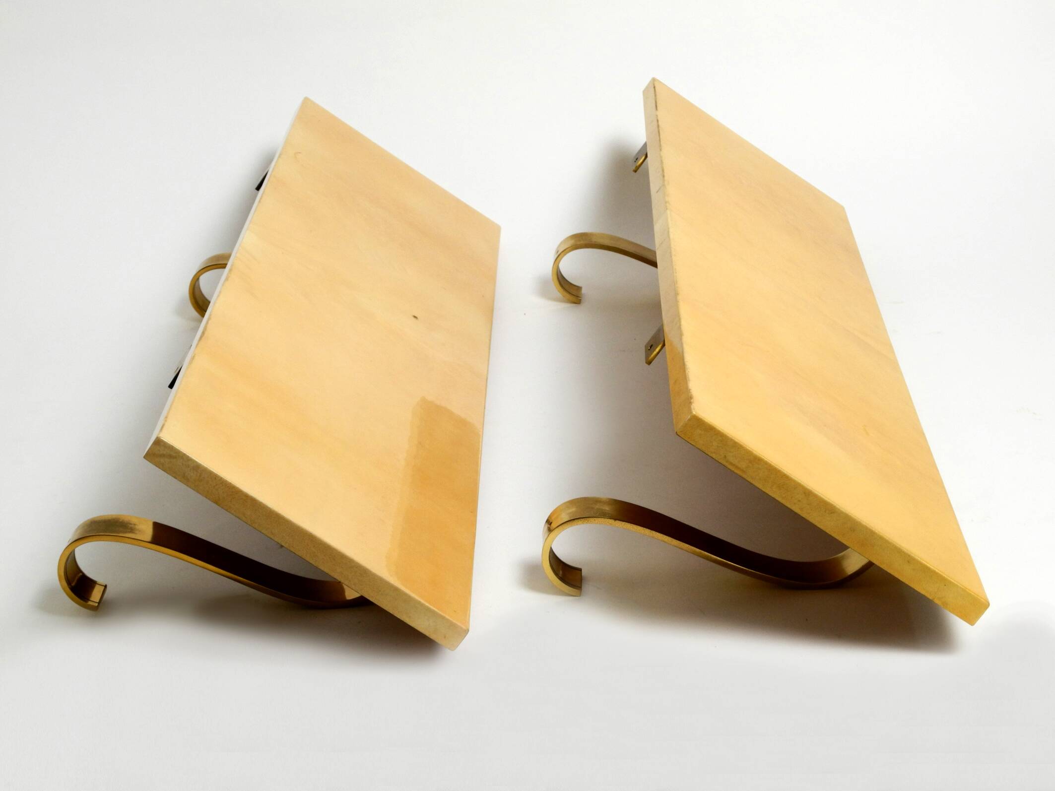 Two 1960s large Aldo Tura shelves made of wood and goatskin in beige