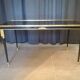 Coffee table in brass and black lacquered metal