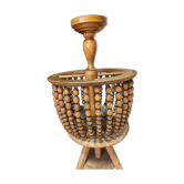 Vintage wooden turned cage chandelier with beads from the 1960s.