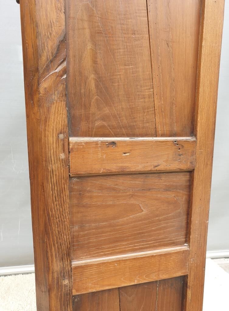 Walnut glazed bookcase with nineteenth century rose window