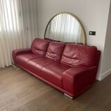 Red leather sofa with ottoman