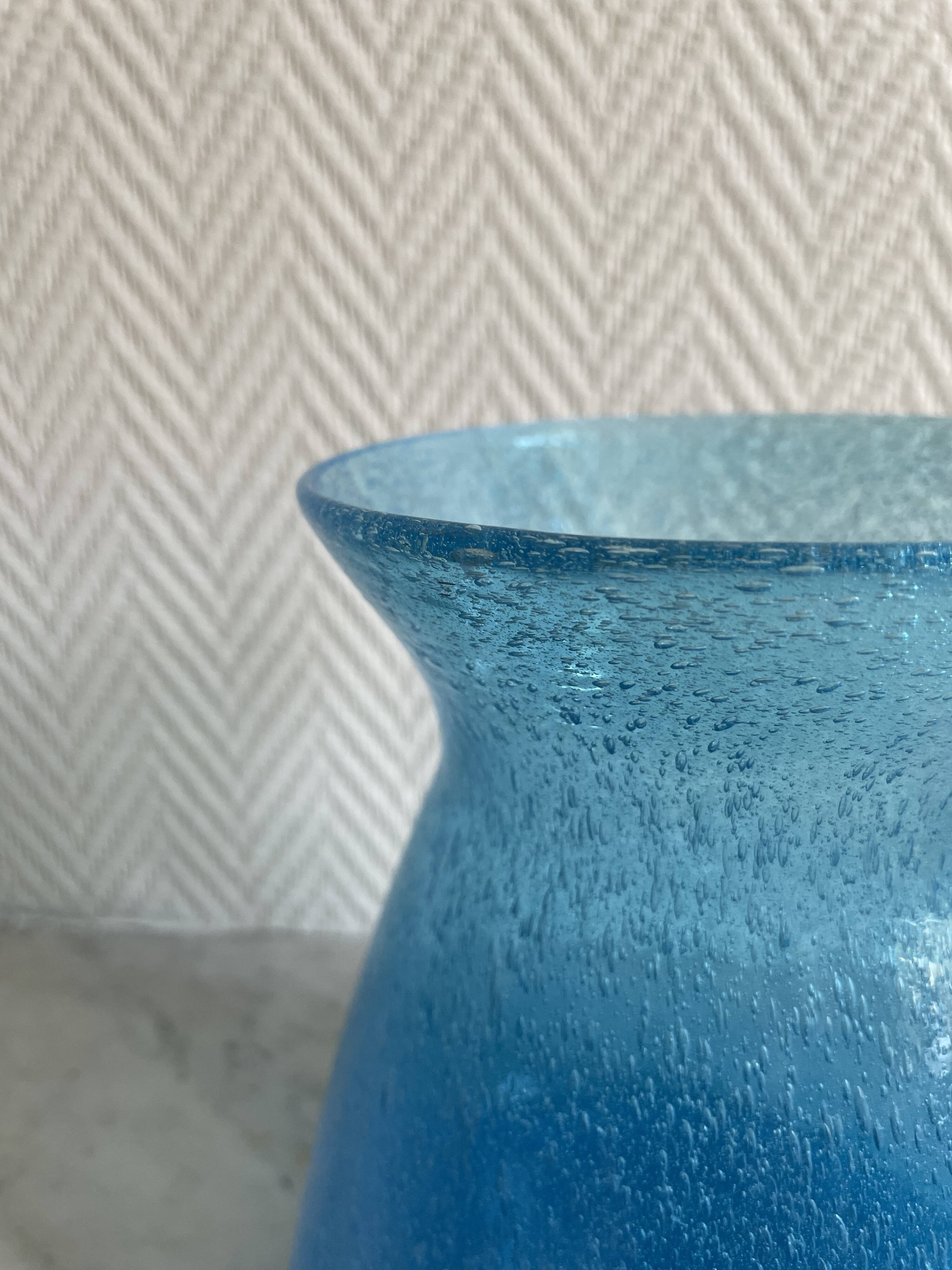 Blue glass vase with encrusted bubbles