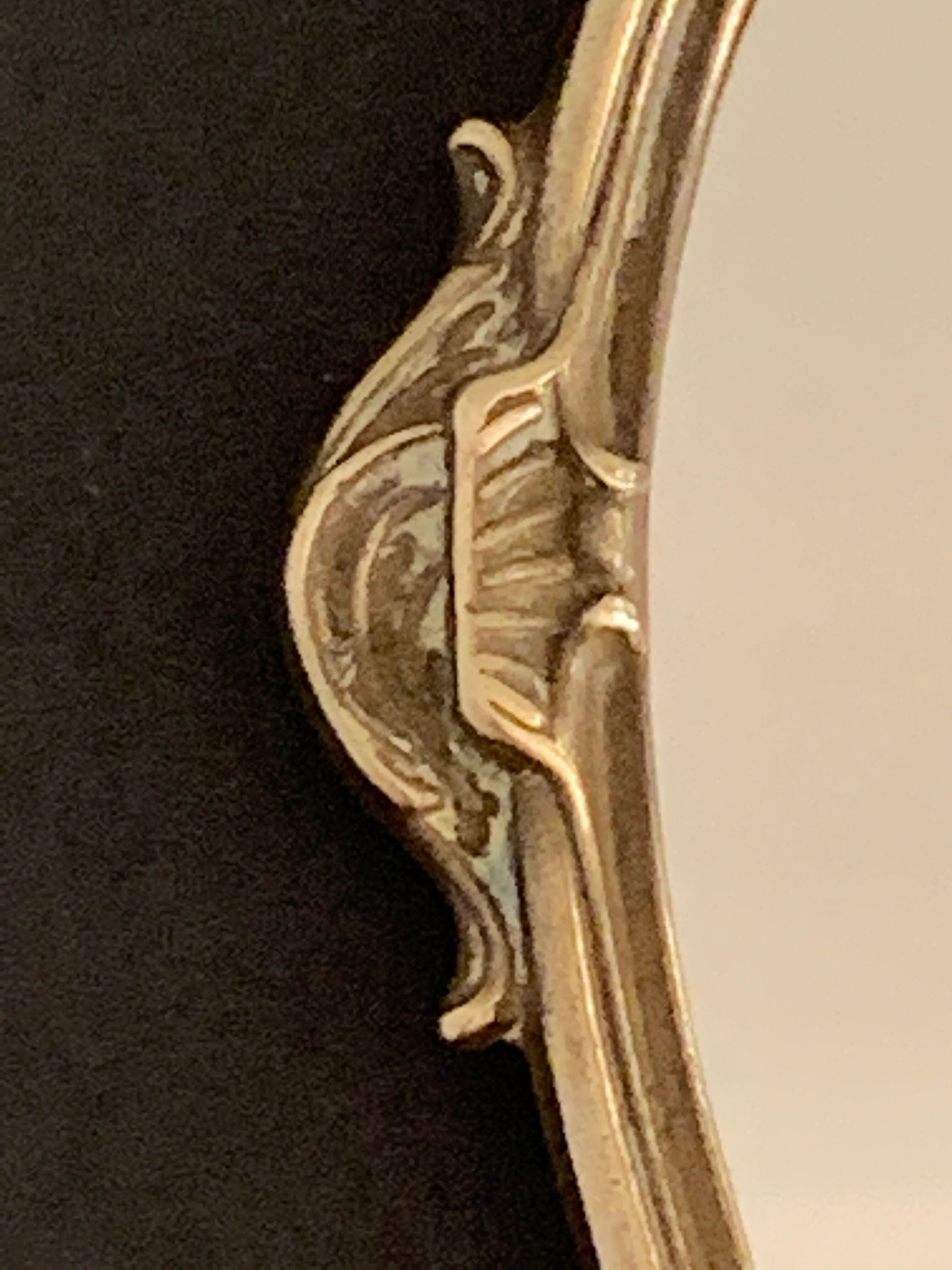 Bronze hand-facing mirror, early twentieth century, Louis XV style, 29 x 13 cm