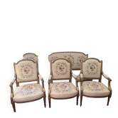 Salon de style Louis XVI bois doré et sculpté, banquette et 4 fauteuils, époque XIXe tapisserie