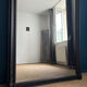 Miroir ancien Louis-Philippe 159cm/115cm décor floral, glace au mercure et piquée.