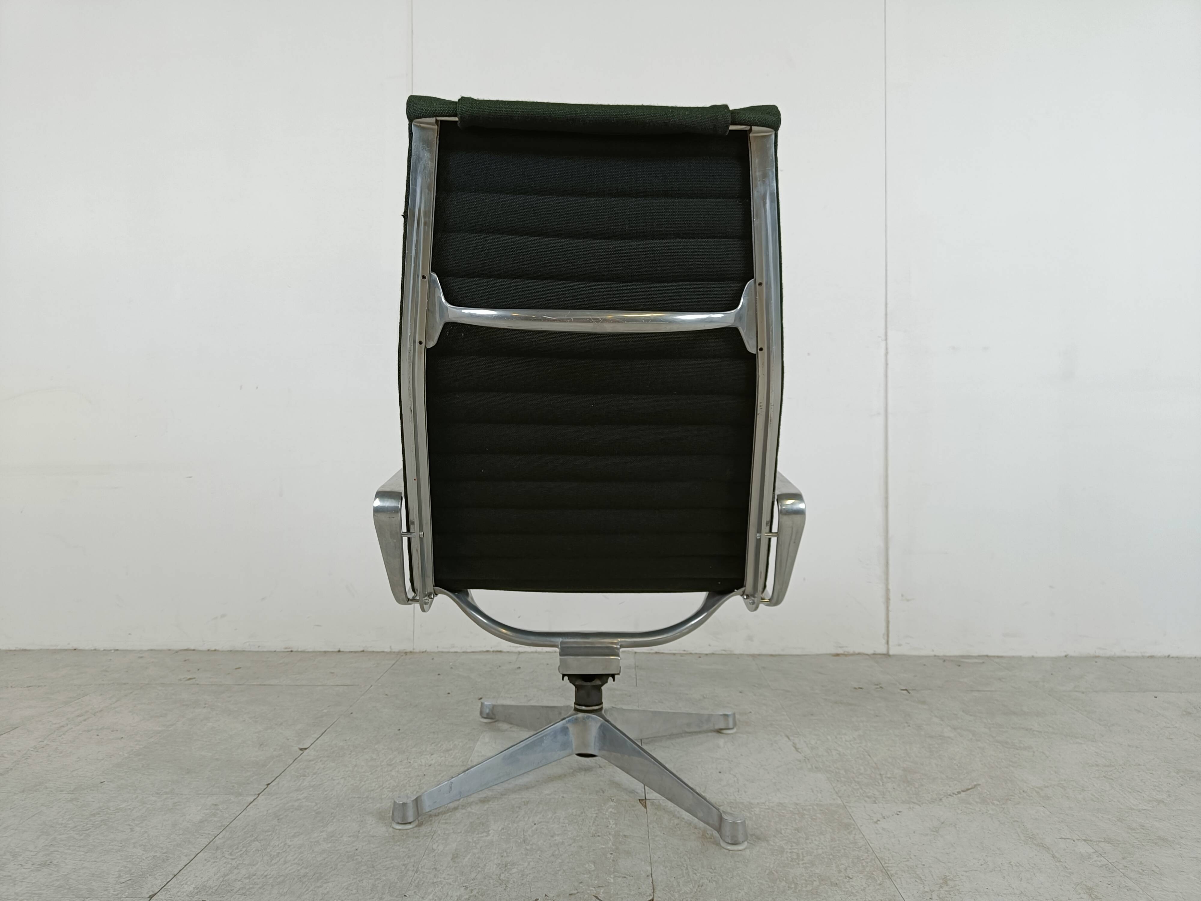 Charles & Ray Eames EA124 Lounge chair in black fabric, 1970s