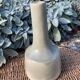 Signed water green glazed ceramic vase
