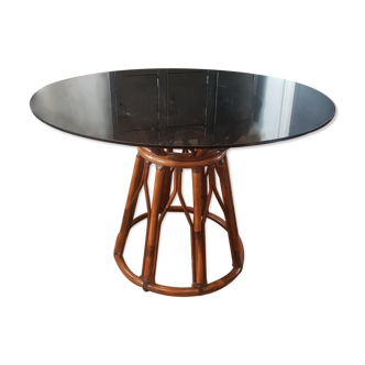 Rattan dining table and smoked glass