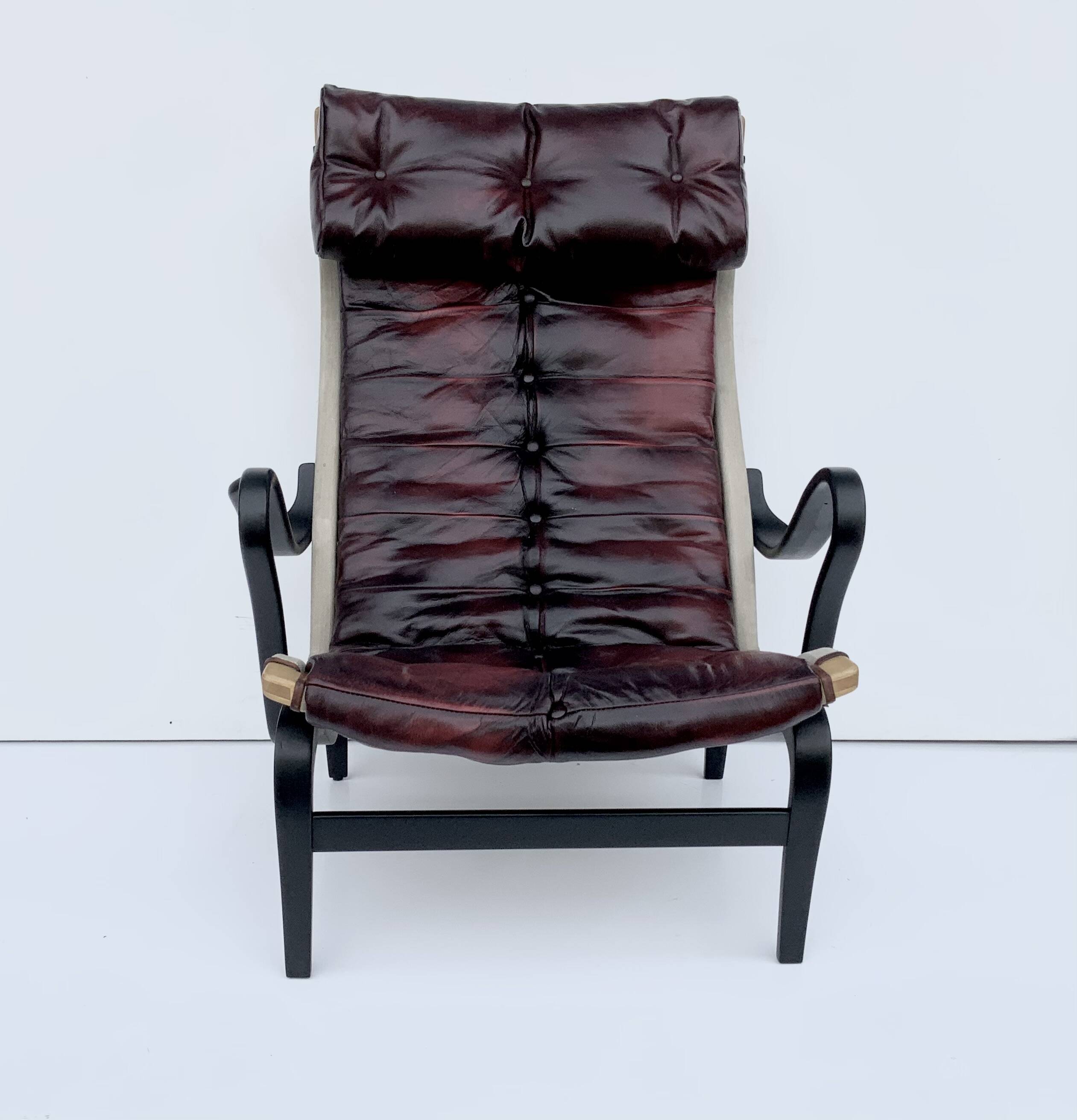 Vintage Pernilla 69 Armchair by Bruno Mathsson for Dux In Oxblood Leather