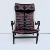 Fauteuil vintage Pernilla 69 de Bruno Mathsson pour Dux en cuir sang de bœuf