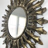 Miroir soleil métal doré