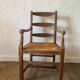 Cherry and straw armchair