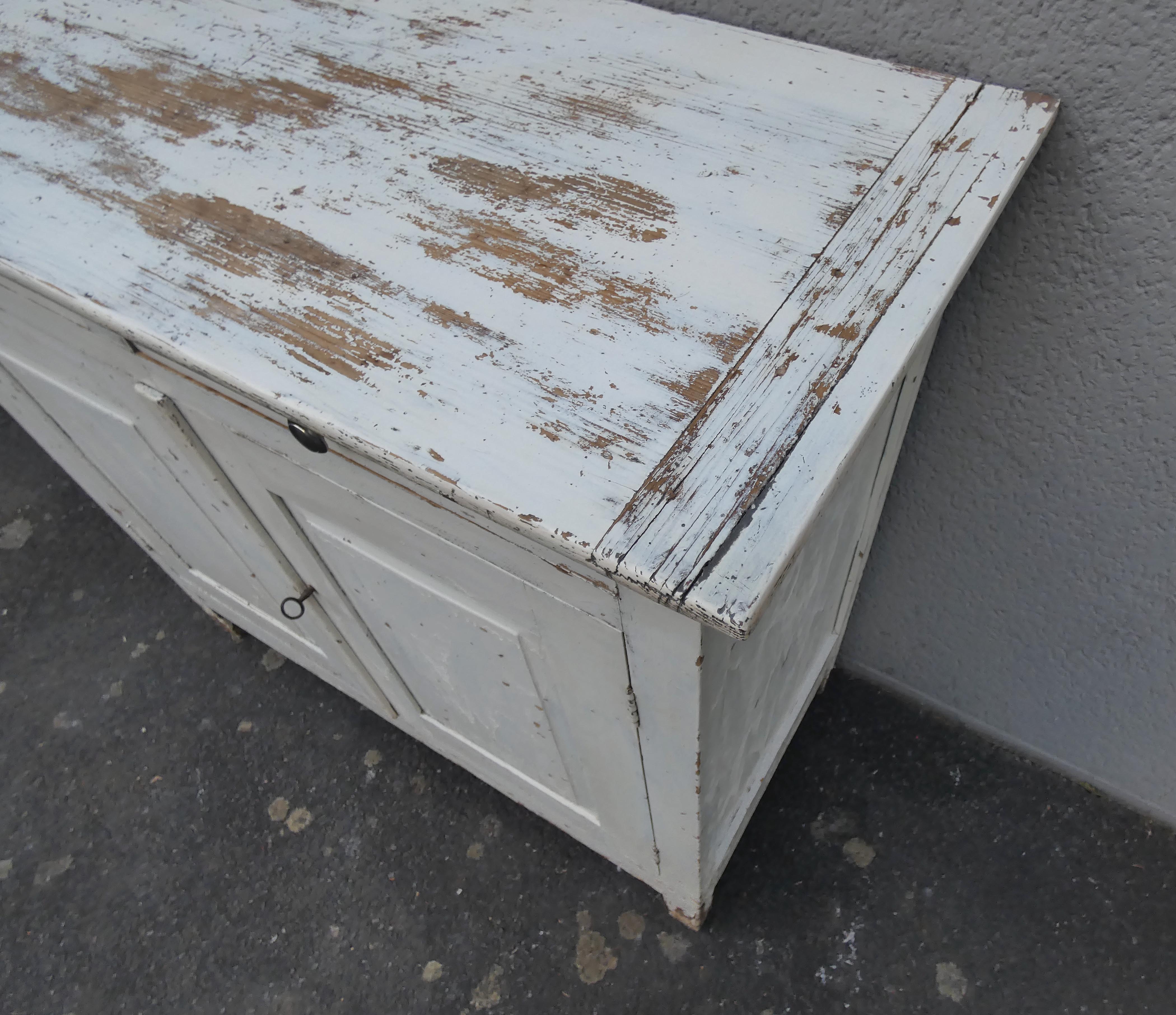 Old patinated wooden sideboard