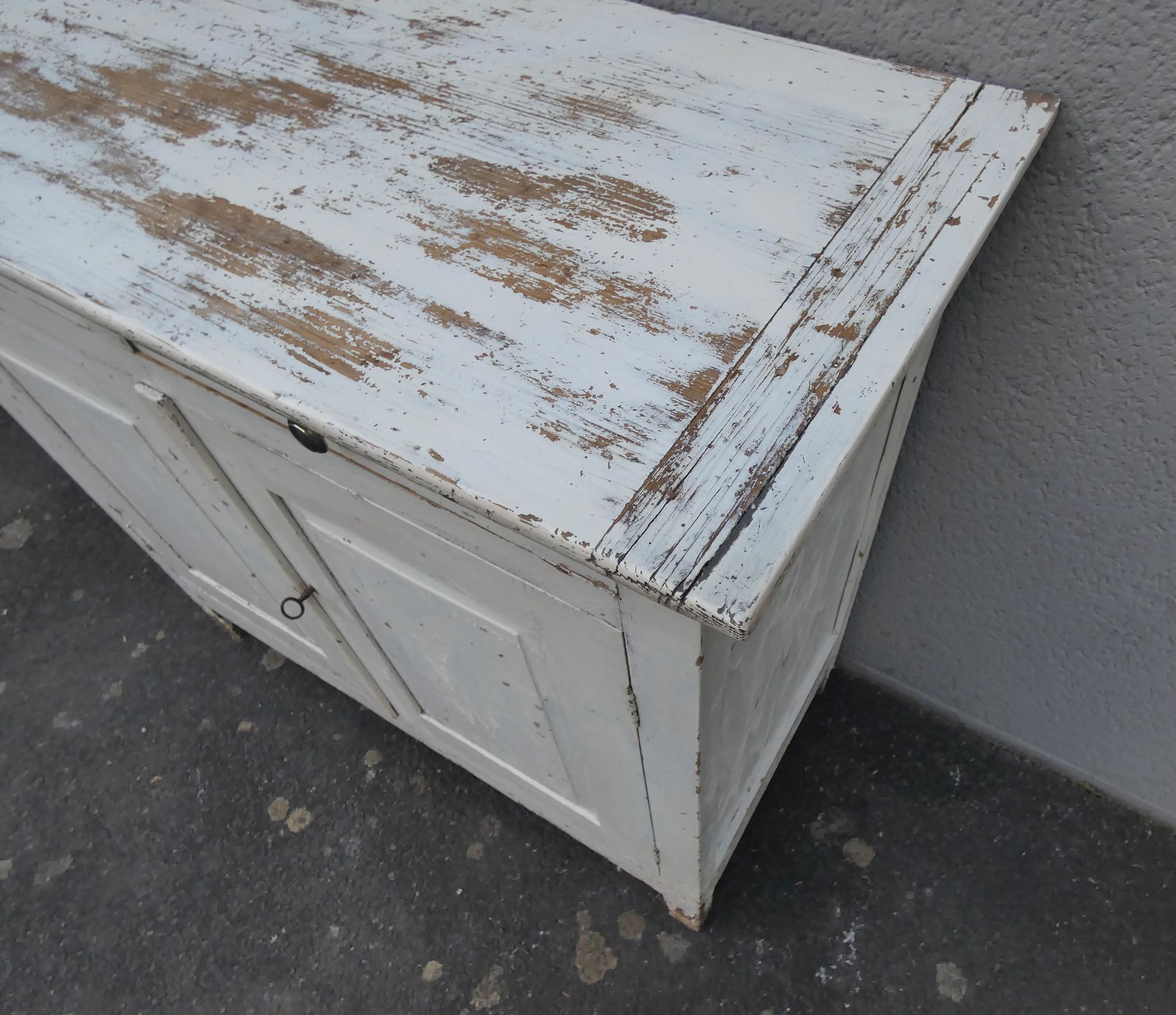 Old patinated wooden sideboard