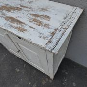 Old patinated wooden sideboard