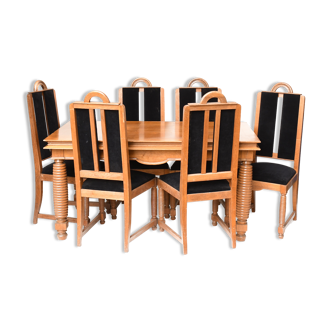 Brutalist style dining room including a table and six chairs