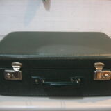 Dark green suitcase