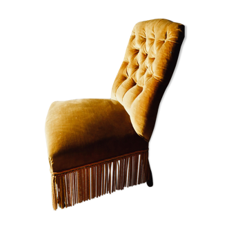 Golden velvet armchair