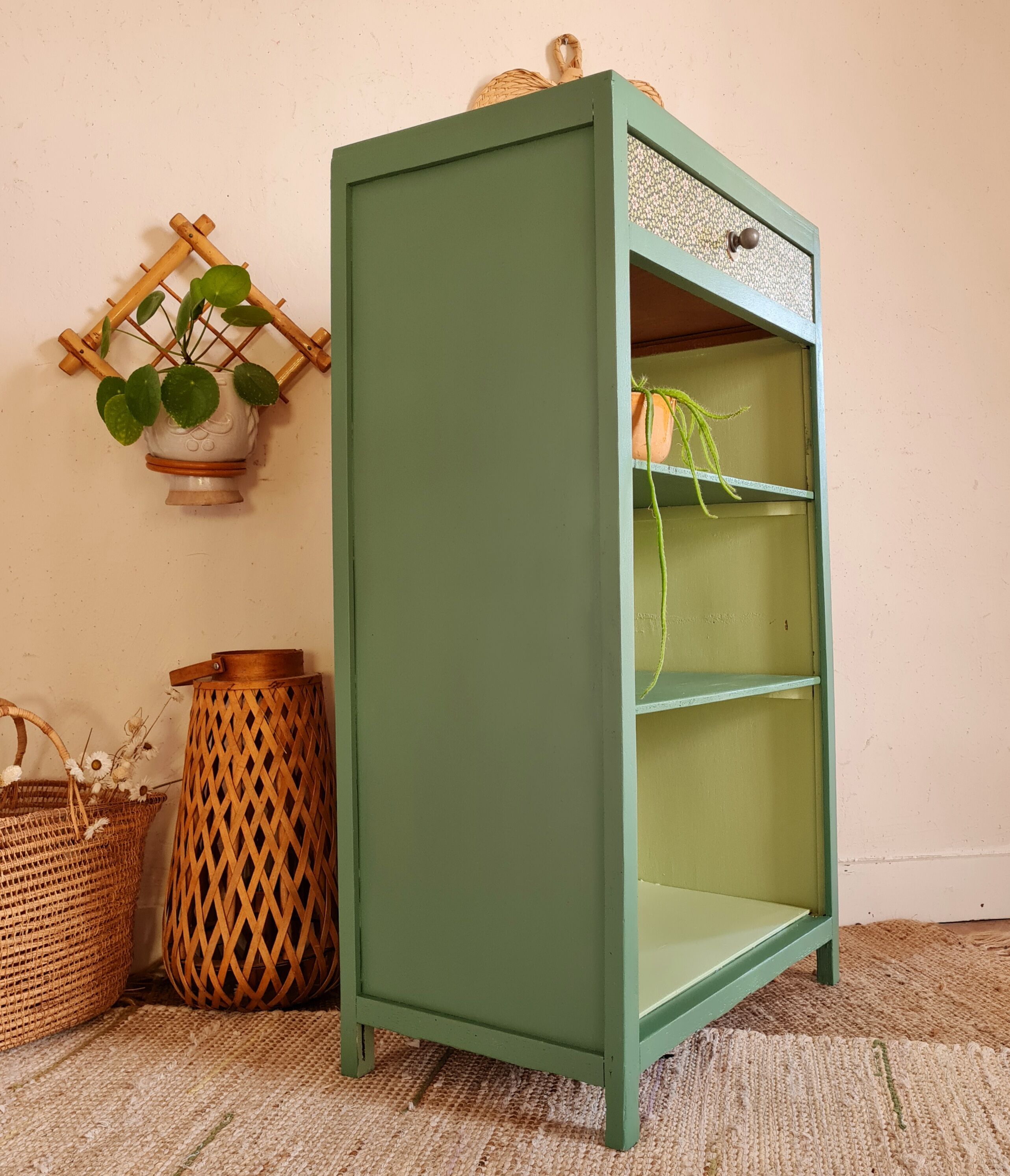 Renovated library shelf green color and floral atmosphere