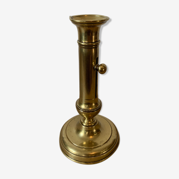 Brass pusher candle holder