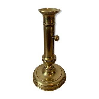 Brass pusher candle holder