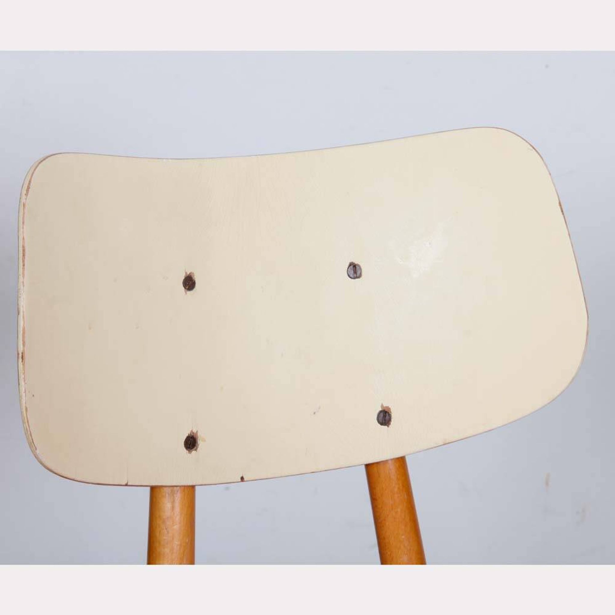 Red chair produced by Ton in the 1960s