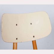 Red chair produced by Ton in the 1960s