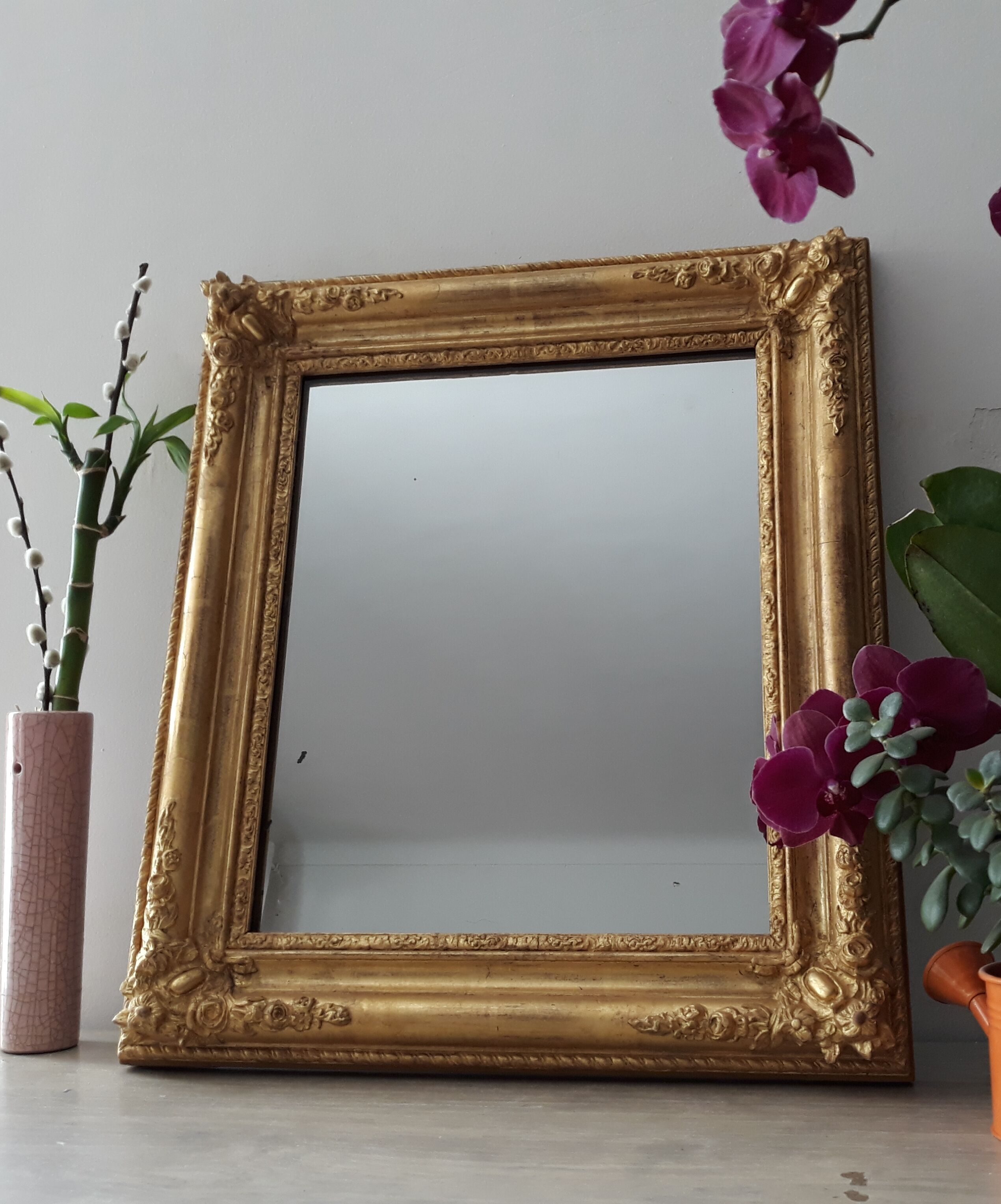 Golden romantic mirror with gold leaf