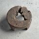 Small low circular four-legged stool in organic old teak with cut-out design H2
