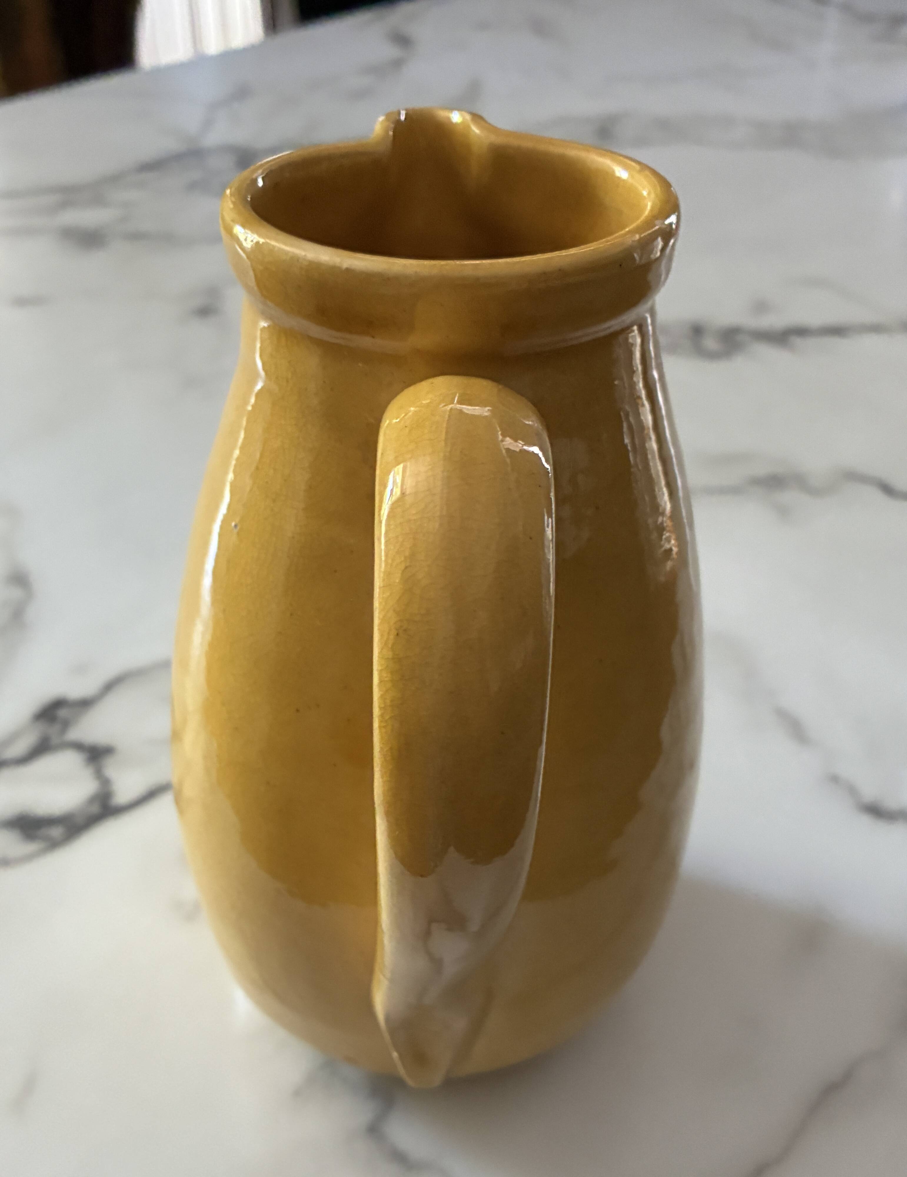 Glazed terracotta jug
