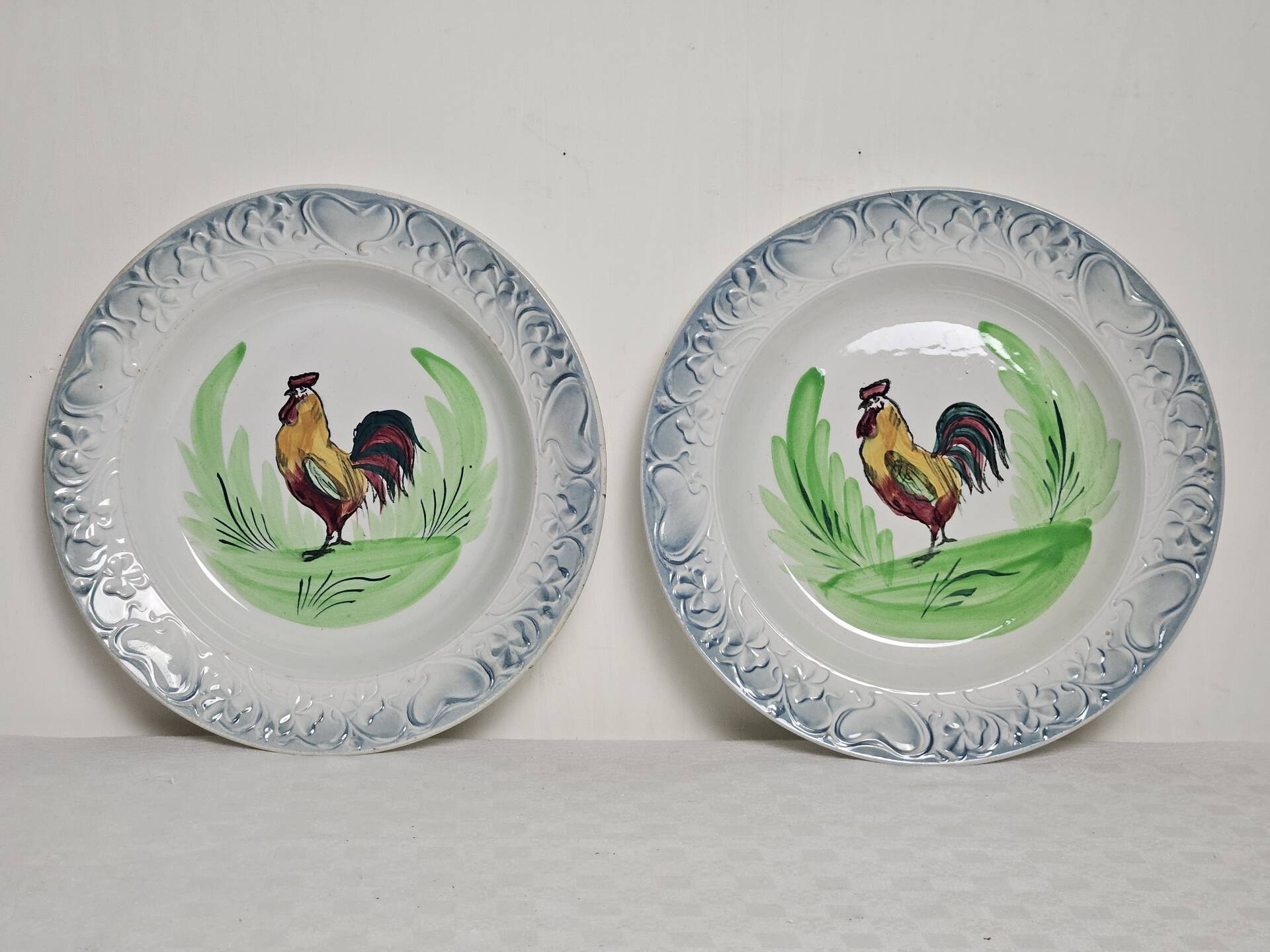 Pair of decorative deep plates with rooster design, St Amand vintage