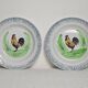 Pair of decorative deep plates with rooster design, St Amand vintage