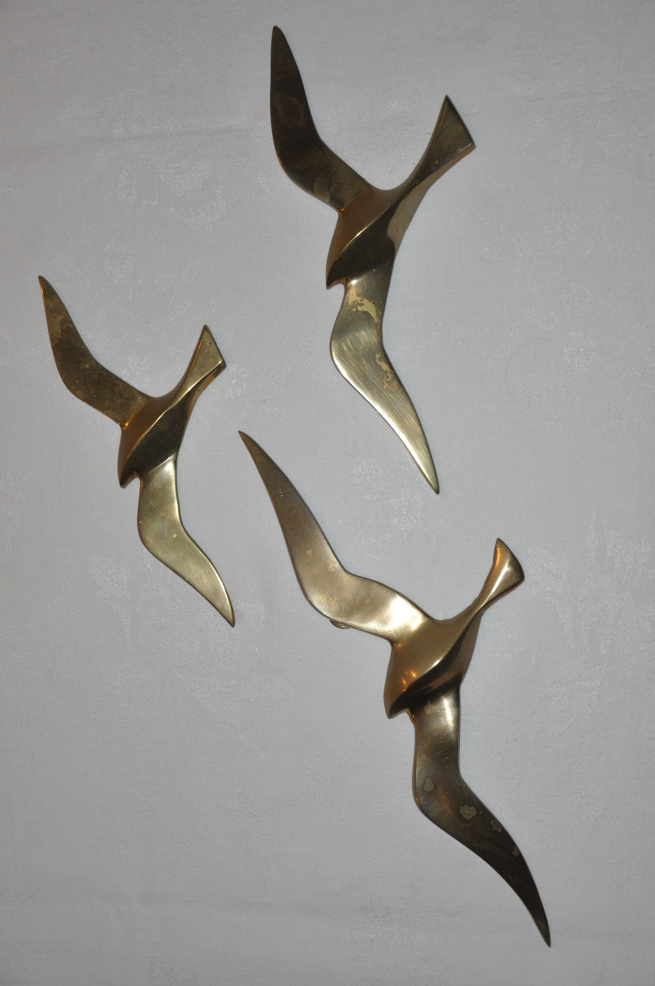 Trio of stylized seagulls in gold brass to hang 70s