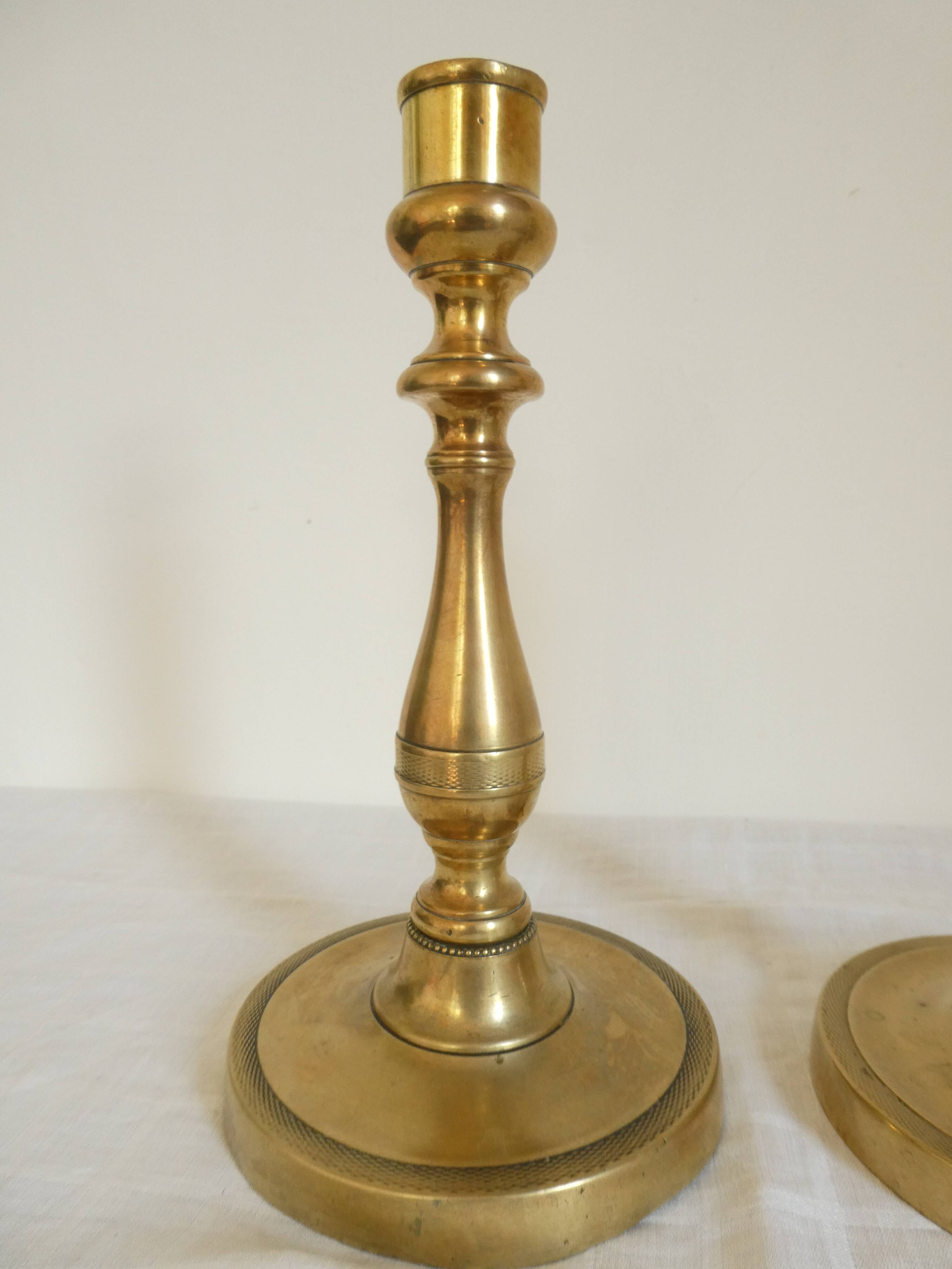Pair of bronze candlesticks from the Restoration period, circa 1820