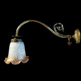 Brass wall lamp with speckled glass tulip