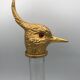 Glass bottle type carafe with gold metal bird head stopper
