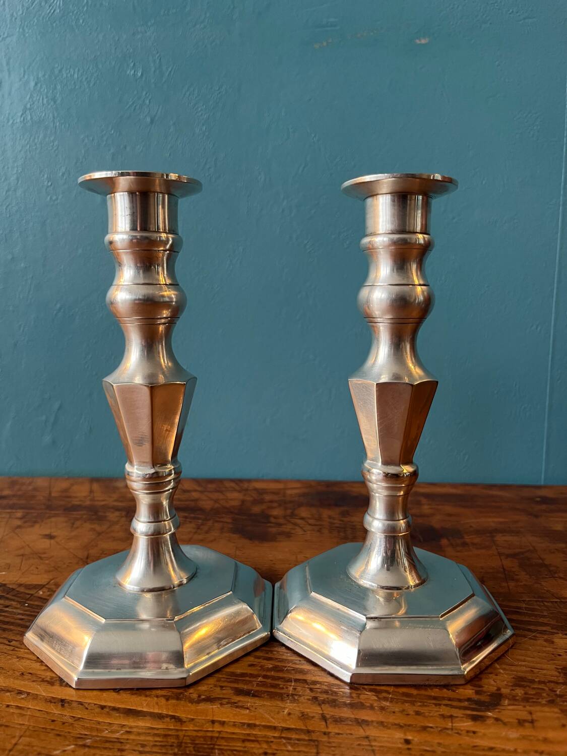 Pair of silver metal candlesticks