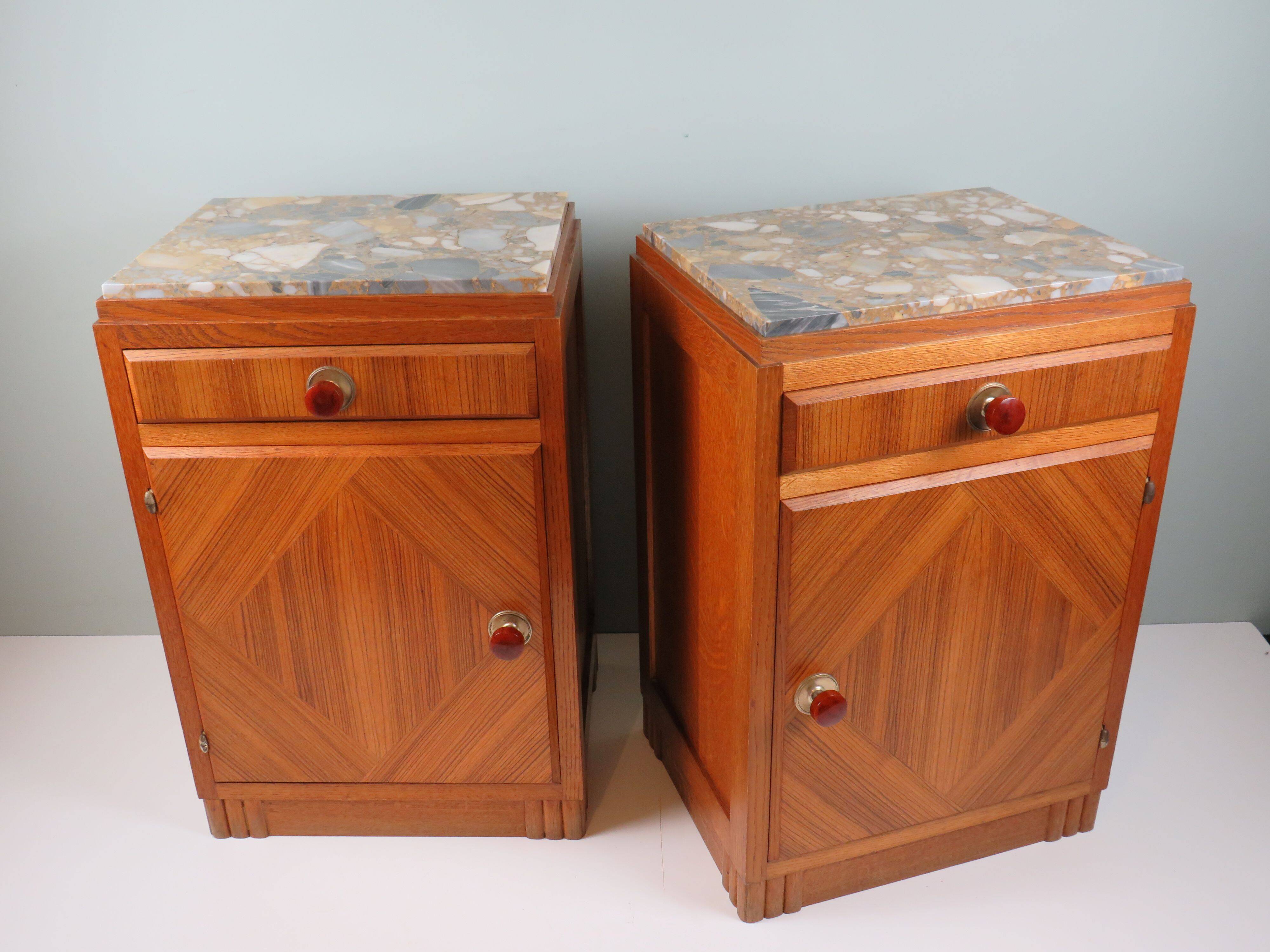 Art Deco bedside tables in oak with an inlaid marble top.