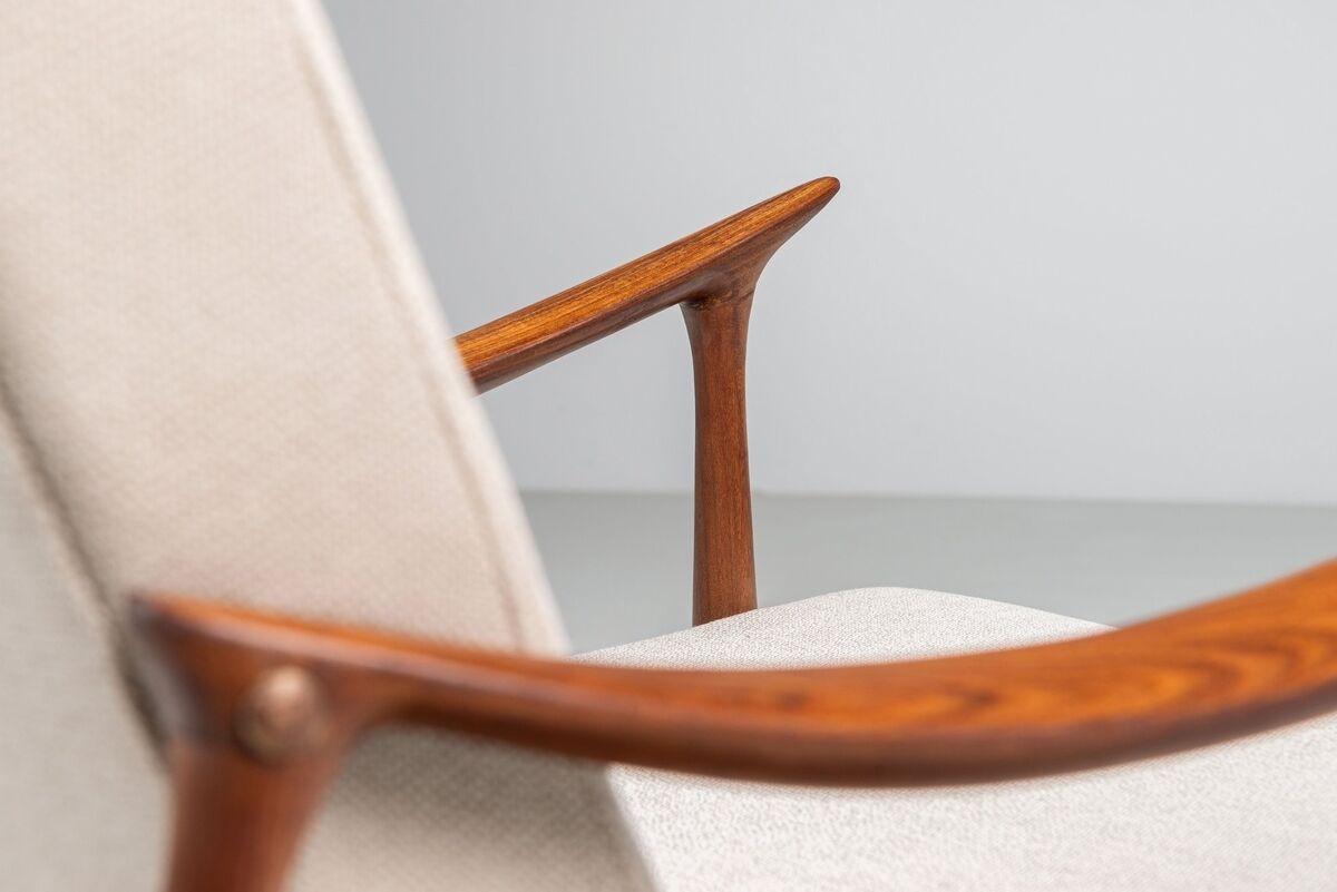 Sculptural Danish lounge chair in teak and fabric Denmark 1960