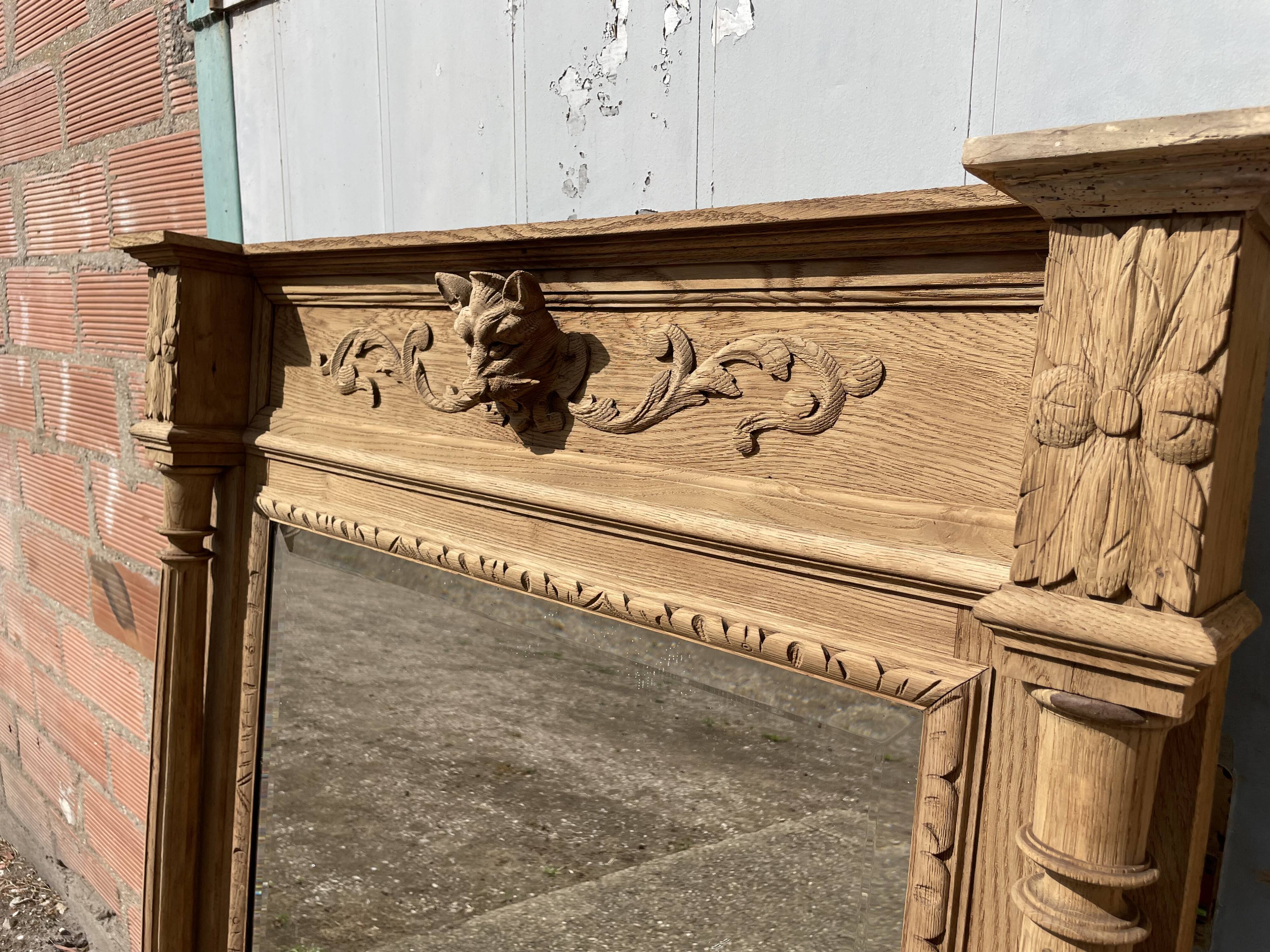 Mirror in oak aero erased wolf's head Henri II