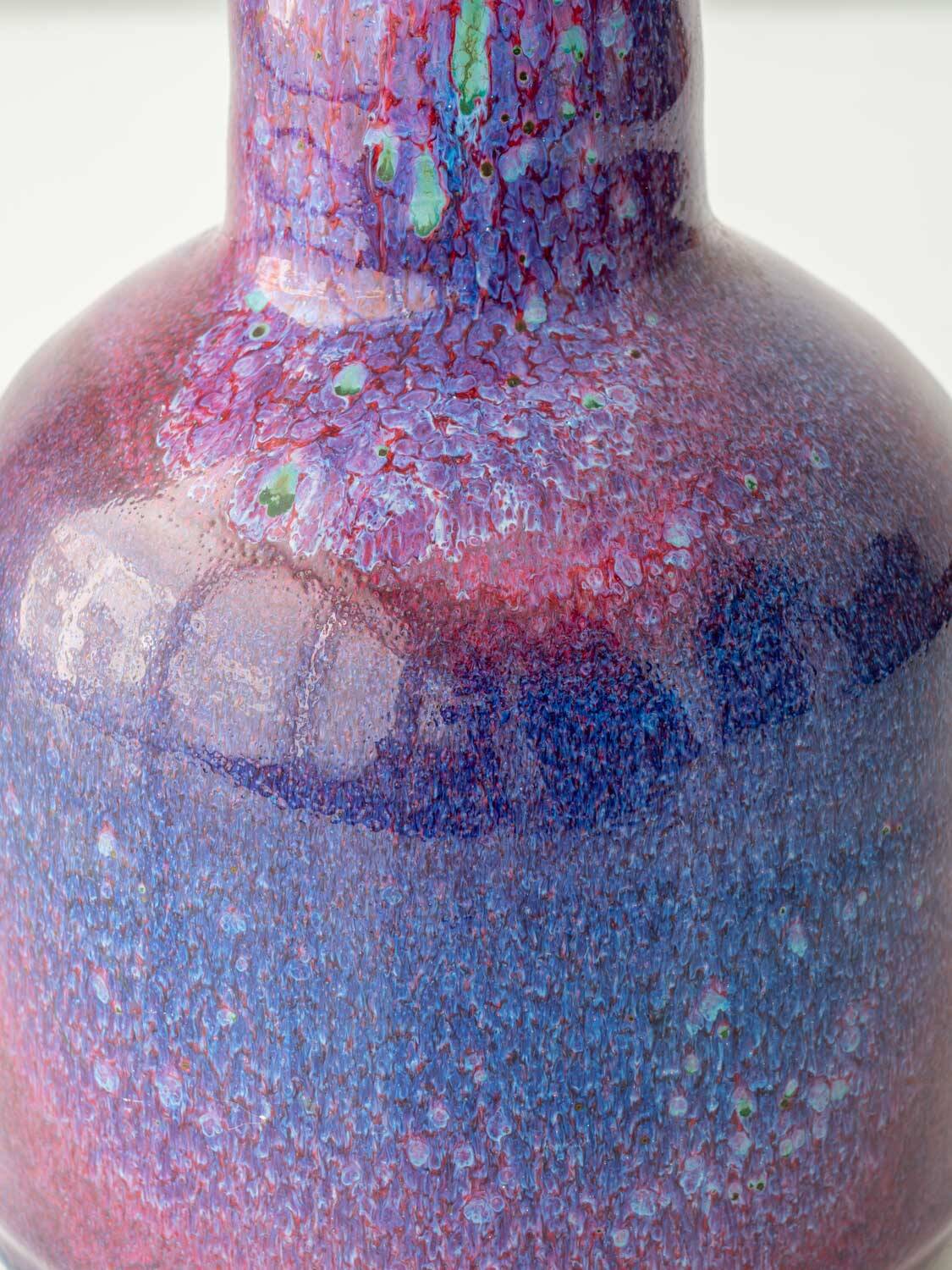 Mid-century modern table lamp by Jaap Ravelli, ceramic base and glass shade.