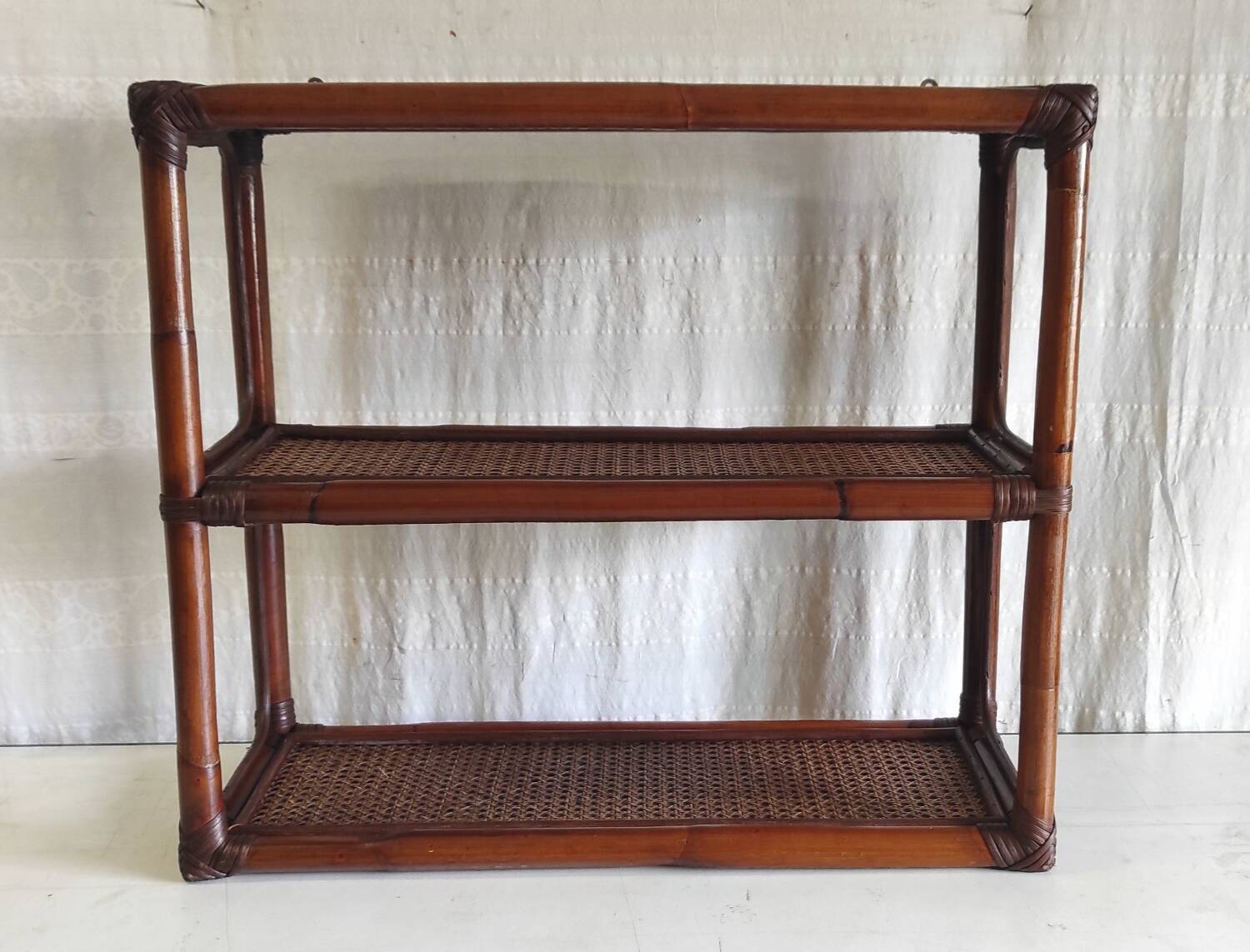 Rattan and cane wall shelf - late 20th century